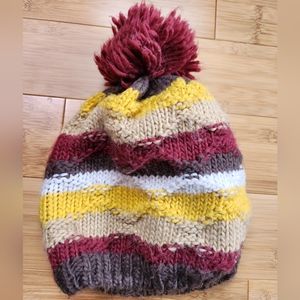 Earthbound striped hat with pom